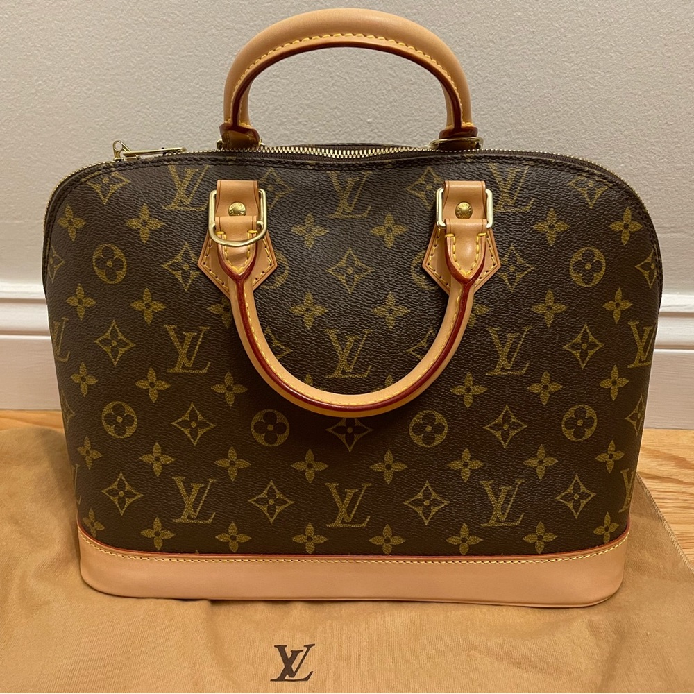 Louis Vuitton Alma monogram bag